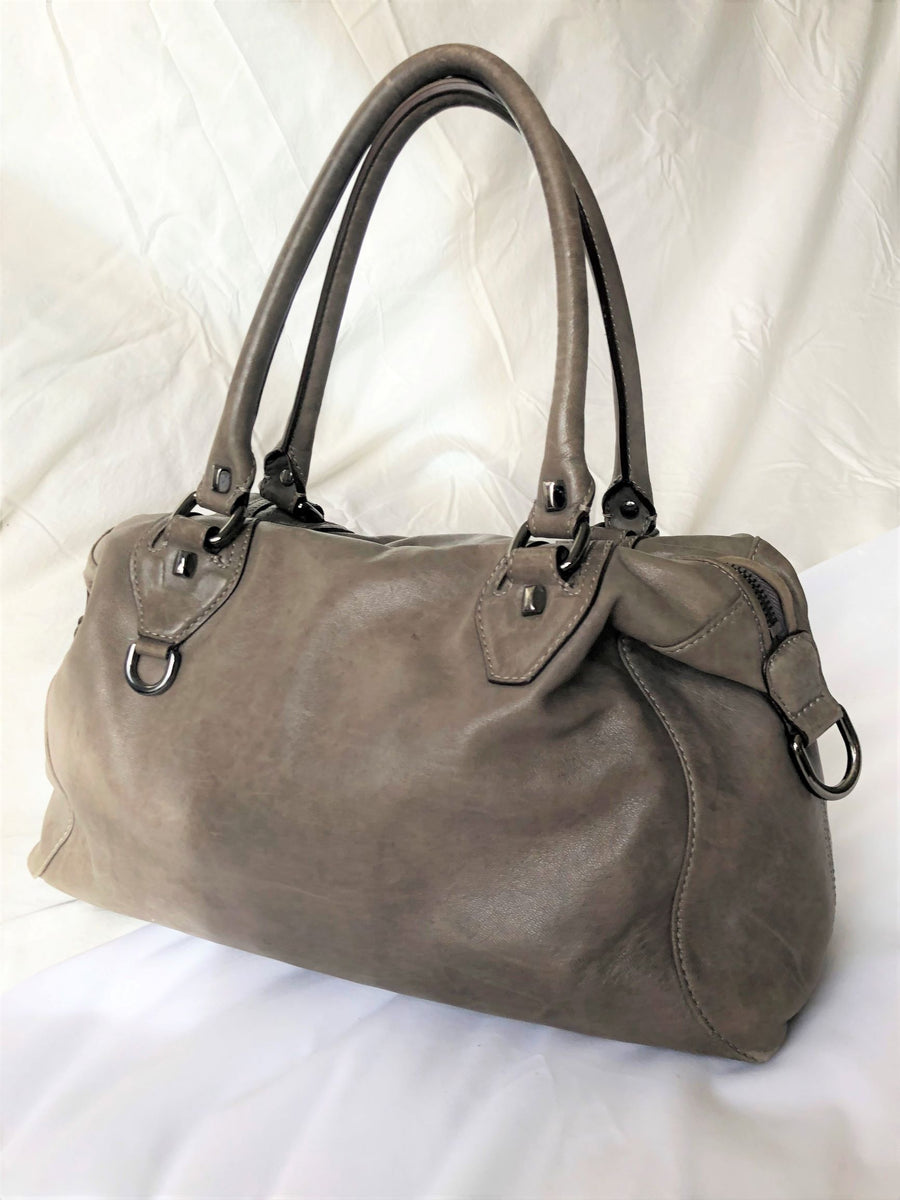 DISSONA Genuine Leather bucket sling bag, Women's Fashion, Bags