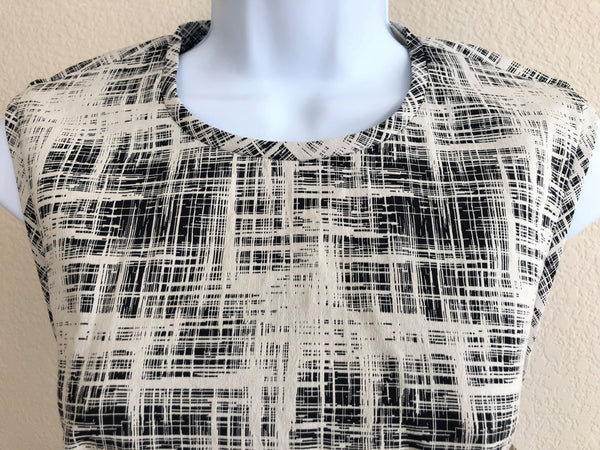 Nicole Miller Size 4 - NEW - Black and White Peplum Dress