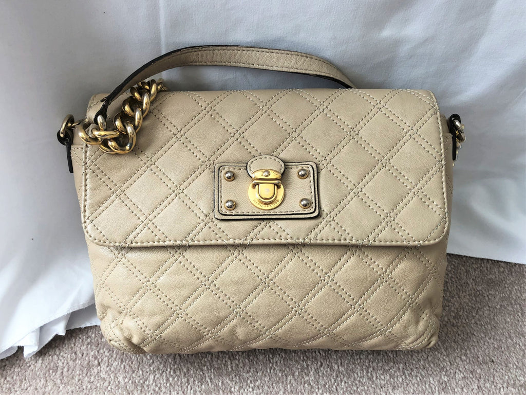 Bag 30 cm, in beige quilted leather, closure on signed f…