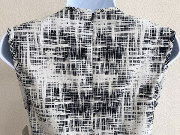 Nicole Miller Size 4 - NEW - Black and White Peplum Dress